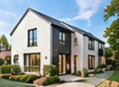 New-build family home with a white render finish